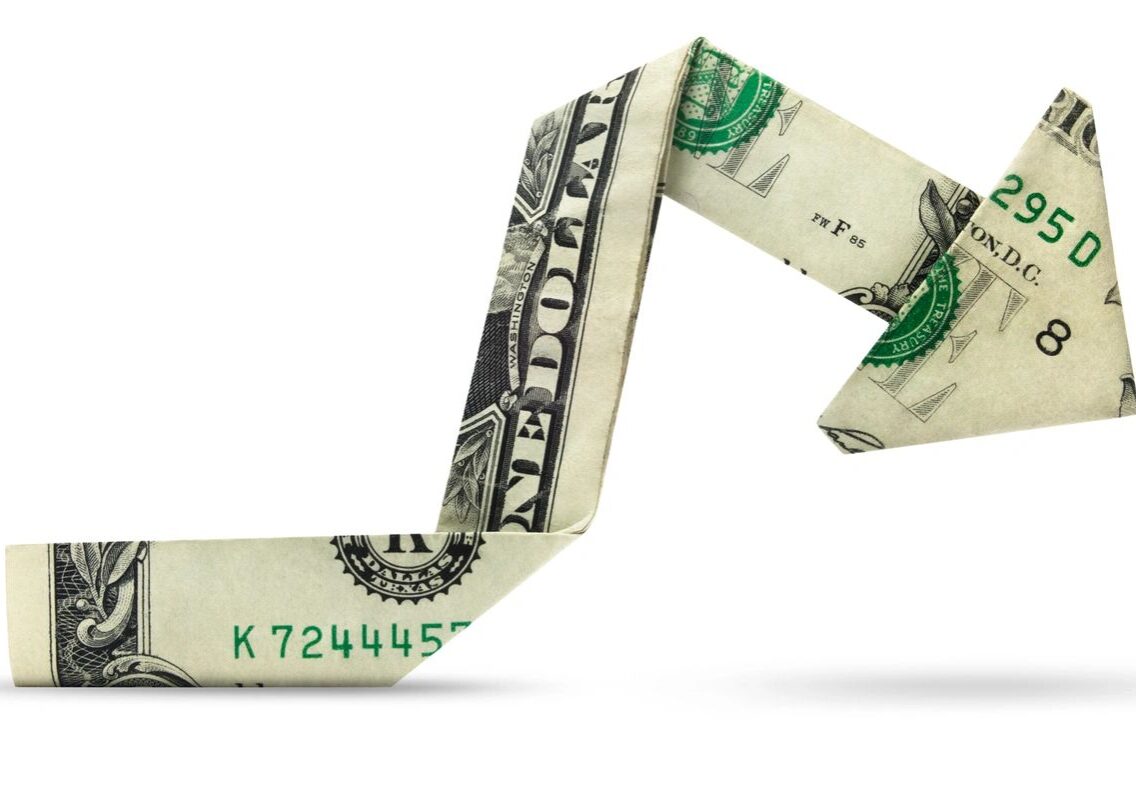A folded dollar bill shaped like a hammer.